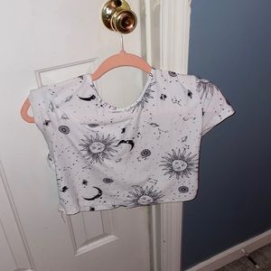 White and black crop top with open back size large with sun moon and galaxy